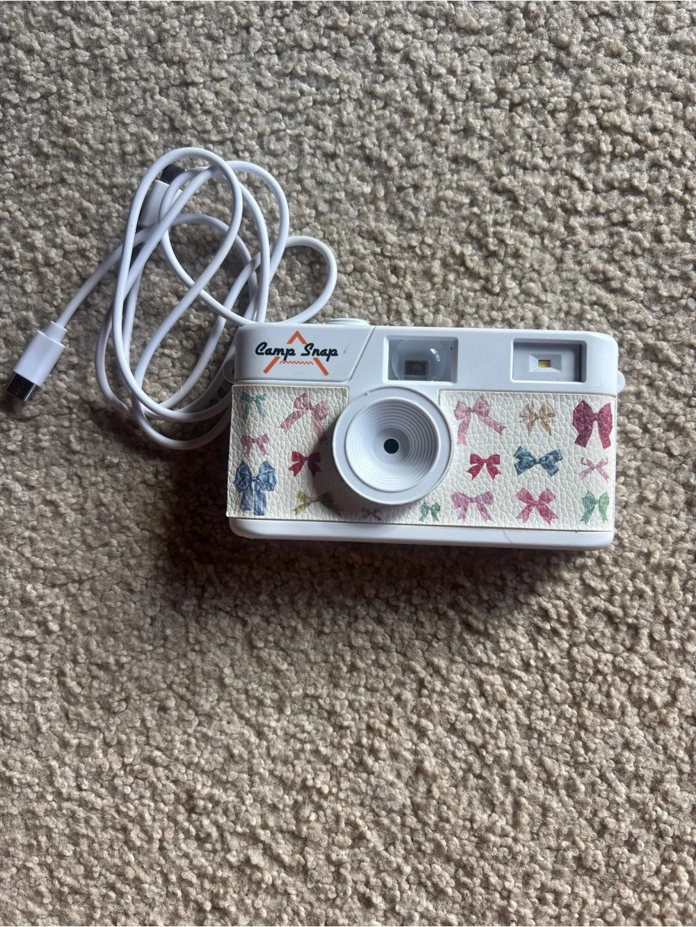 Campsnap Camera from Urban Outfitters- takes vintage photos that sync to iphone